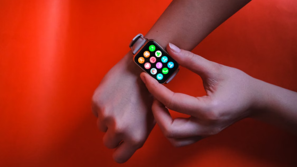 A macro view of a high-tech laboratory assembly highlighting the physical foundations of smartwatch features compared to a smartwatch software update