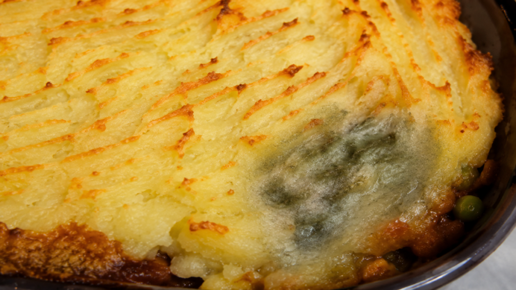 Green-potato-layer-showing-the-primary-mistakes-to-avoid-when-serving-vegetarian-shepherdโs-pie-recipe.