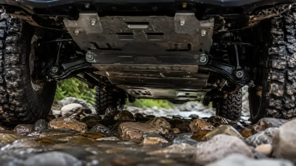 Heavy duty underbody protection skid plates installed on an Off Road SUV