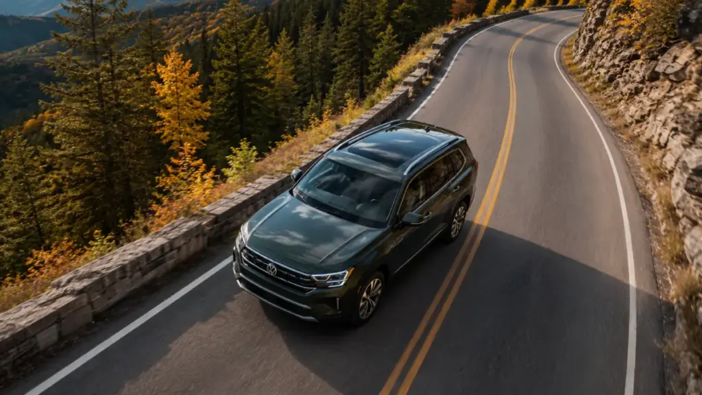 Volkswagen Atlas driving through a mountain pass showing body control and handling