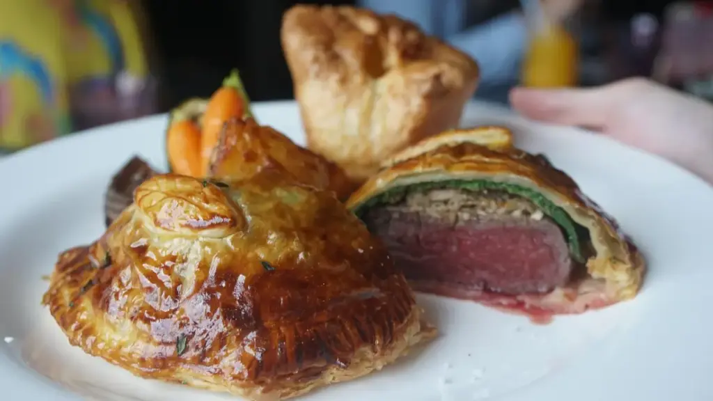 applying-dijon-mustard-to-seared-beef-tenderloin-for-a-beef-wellington-food-network-recipe