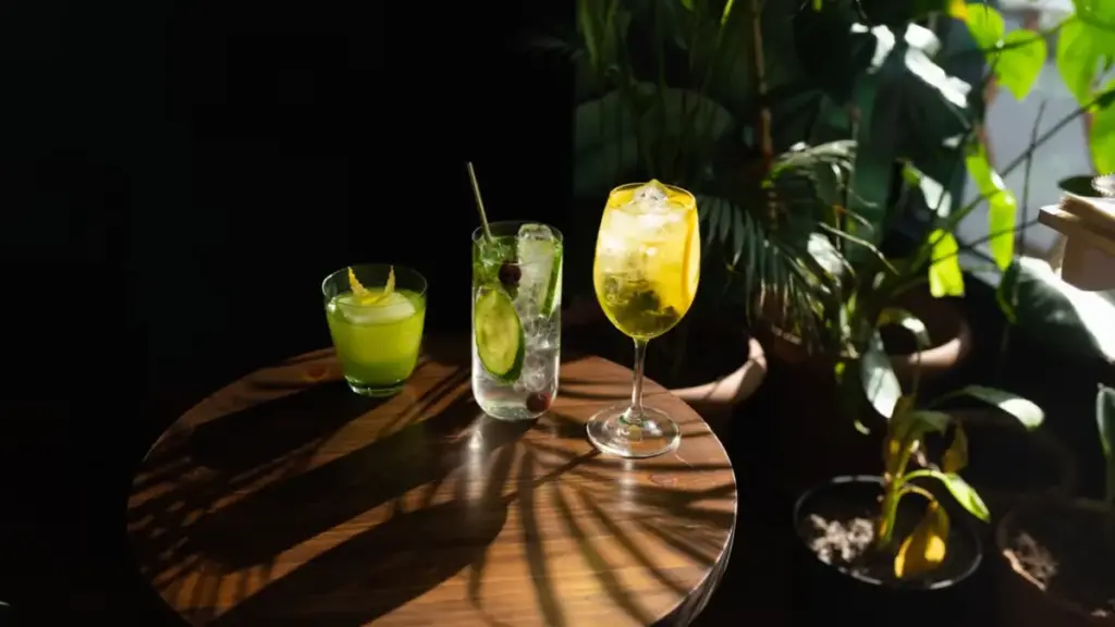 bartender-blending-multiple-strong-liquors-into-a-single-glass-for-heavy-summer-cocktail-drinks