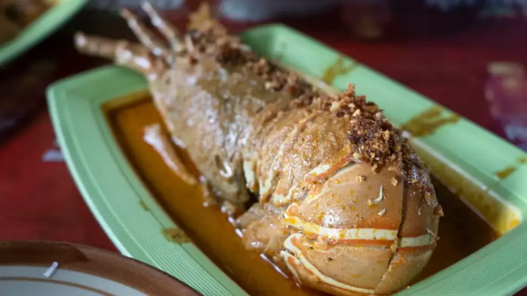 blending-mayonnaise-and-dijon-mustard-to-secure-a-creamy-seafood-sauce