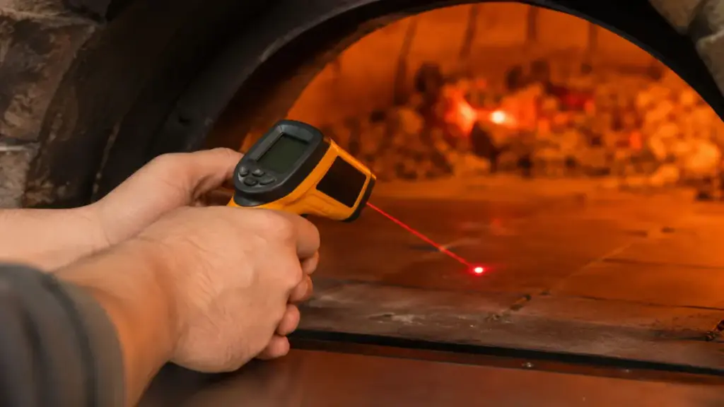 checking-the-internal-stone-floor-temperature-of-a-wood-fired-pizza-oven-with-a-laser-gun