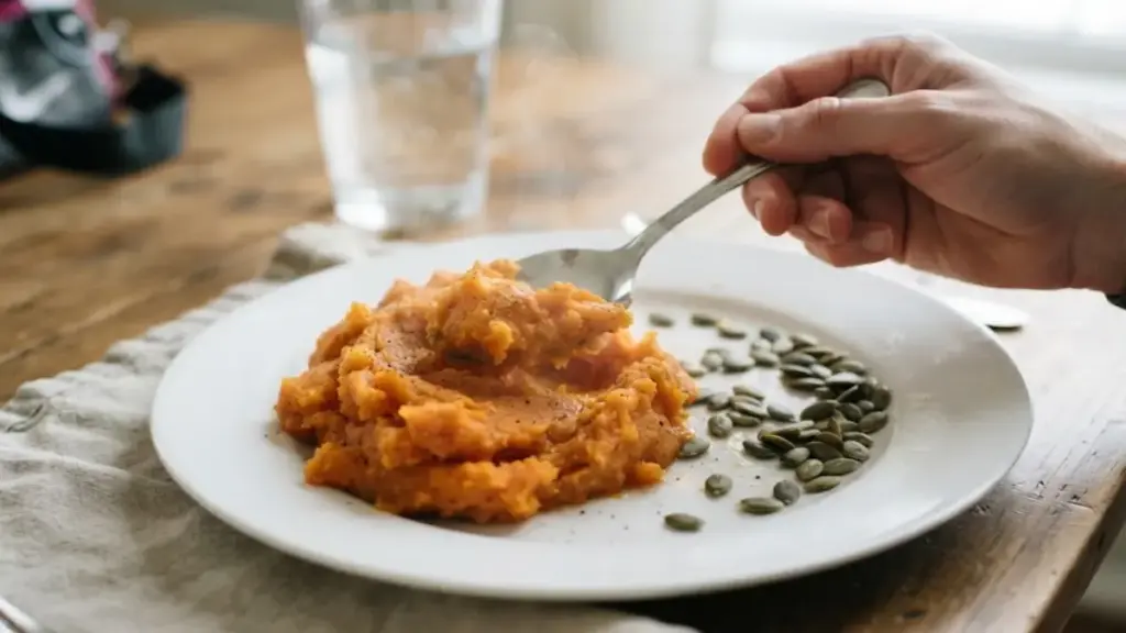 cooked-sweet-potatoes-and-pumpkin-seeds-on-a-clean-white-plate-for-fuel-couchinsider