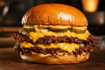 elegant golden brown double cheeseburger with shattered lacy edges