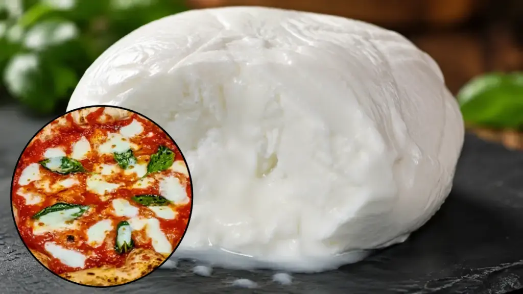 fresh-mozzarella-di-bufala-cheese-block-leaking-natural-whey-on-a-slate-board