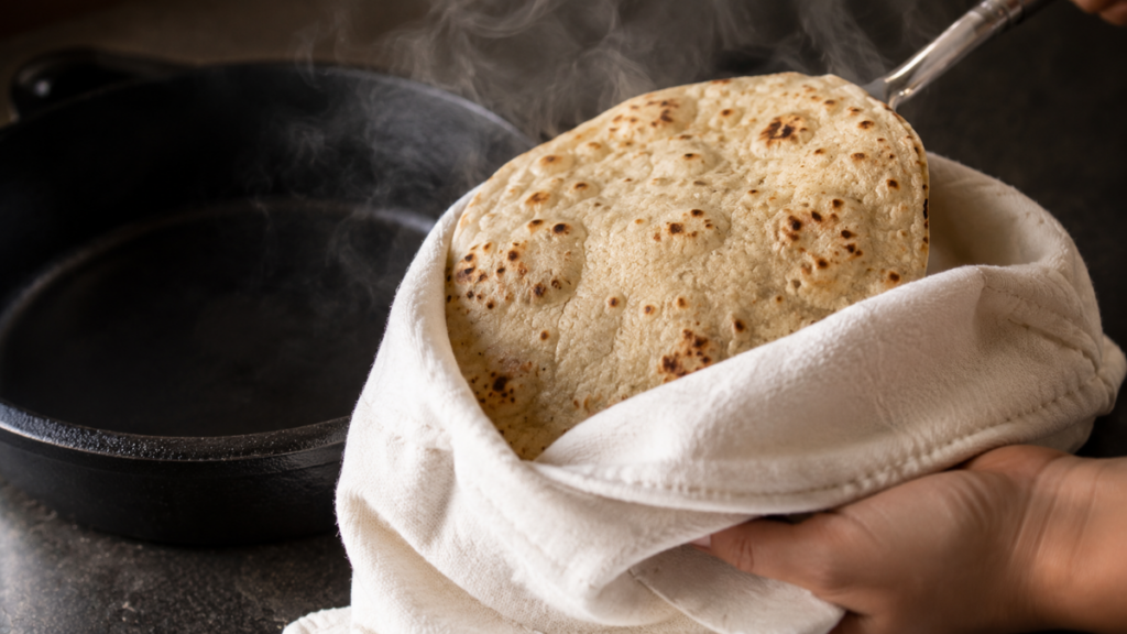 wrapping-freshly-baked-sheets-in-cloth-to-soften-gluten-free-flour-tortillas
