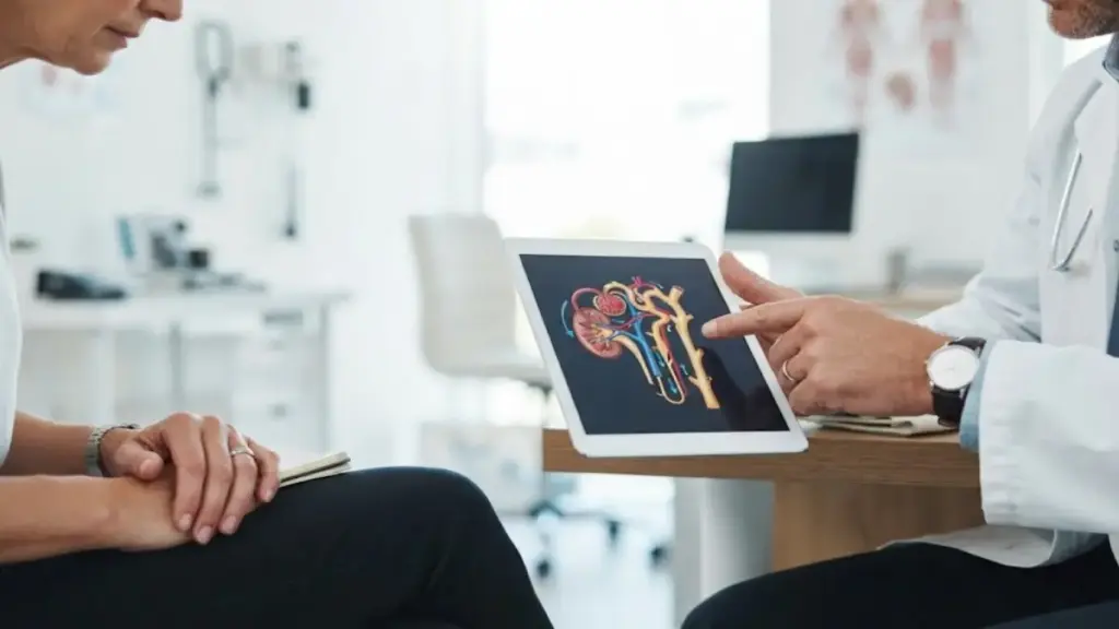 medical-doctor-explaining-kidney-filtration-graphics-on-a-tablet-screen