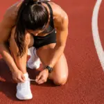 mile run athlete preparing on track stadium