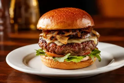 premium gourmet burger presentation showcasing vibrant textures and proper beef grind metrics