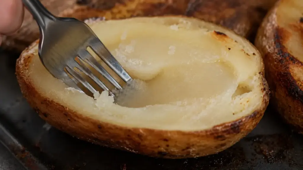 pressing-a-hard-raw-centered-potato-slice-with-a-fork-to-show-quick-meal-failures