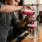 cocktail pink noise bartender pouring mix